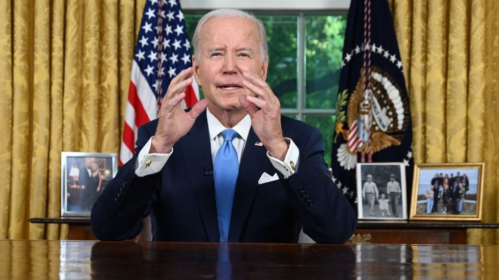 Biden says debt ceiling deal averted economic collapse