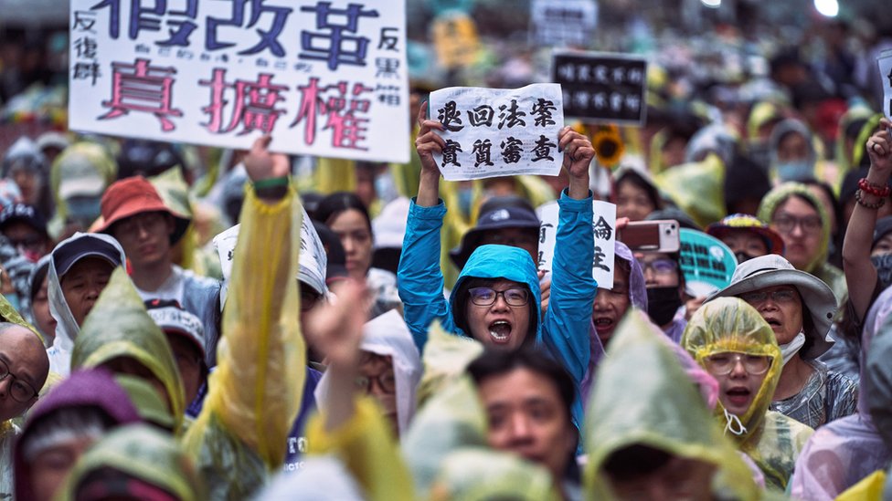 Protestors during a demonstration outside the Legislative Yuan in Taipei, Taiwan, on Tuesday, May 28, 2024. Taiwan lawmakers passed legislation that could curb the authority of newly inaugurated President Lai Ching-te as thousands of protesters gathered outside parliament to oppose the changes. Photographer: An Rong Xu/Bloomberg via Getty Images