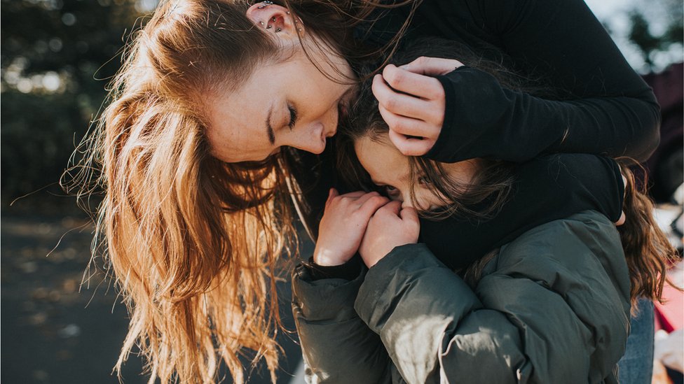 Woman comforting a child