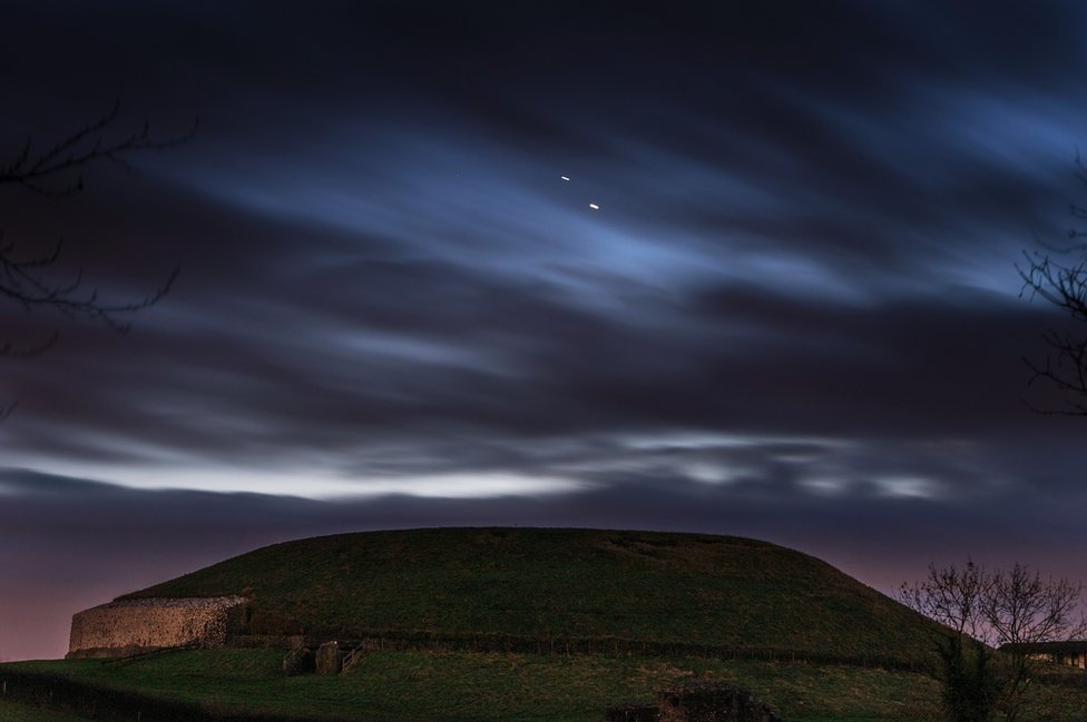 Jupiter and Saturn pictured over Newgrange in County Meath