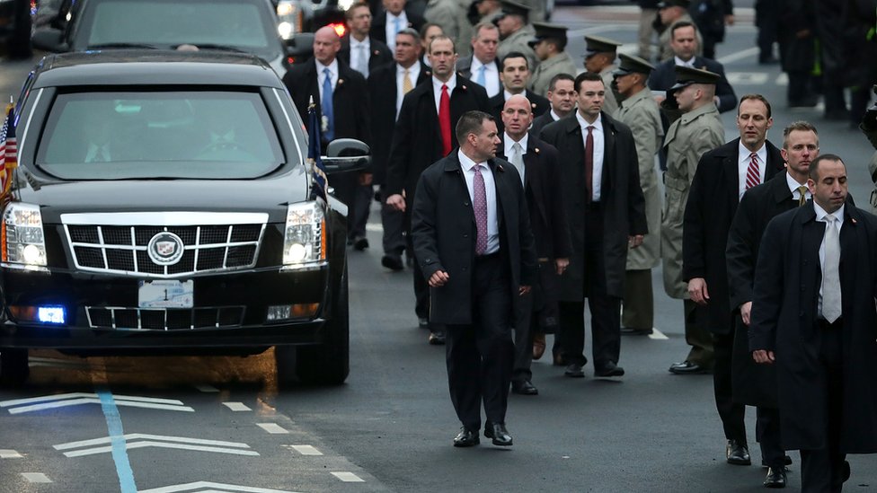 Secret Service protection agents around the president's limousine