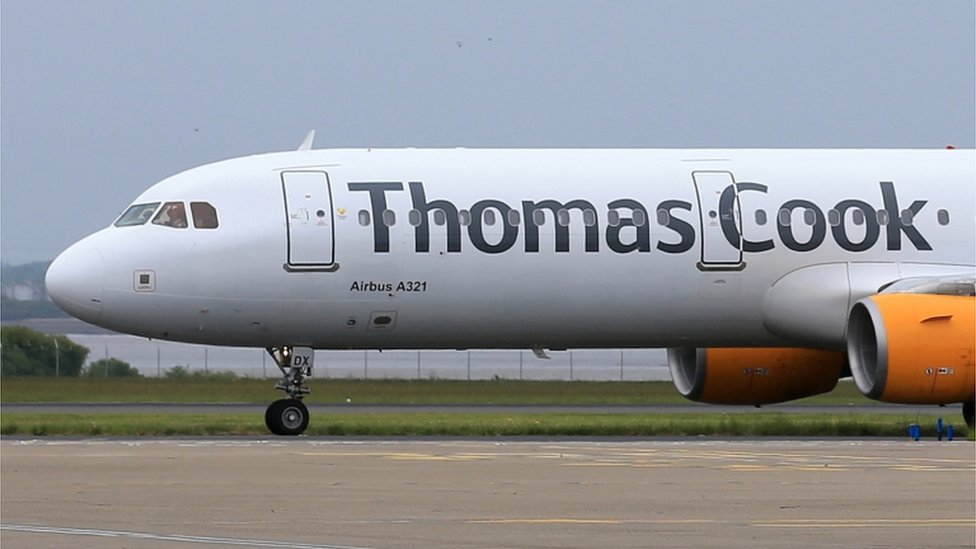 Thomas Cook plane crop top passenger 
