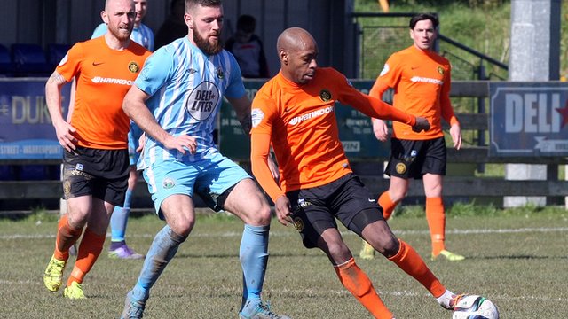 Action from Warrenpoint against Carrick Rangers