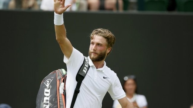 Liam Broady waves goodbye to his first Wimbledon