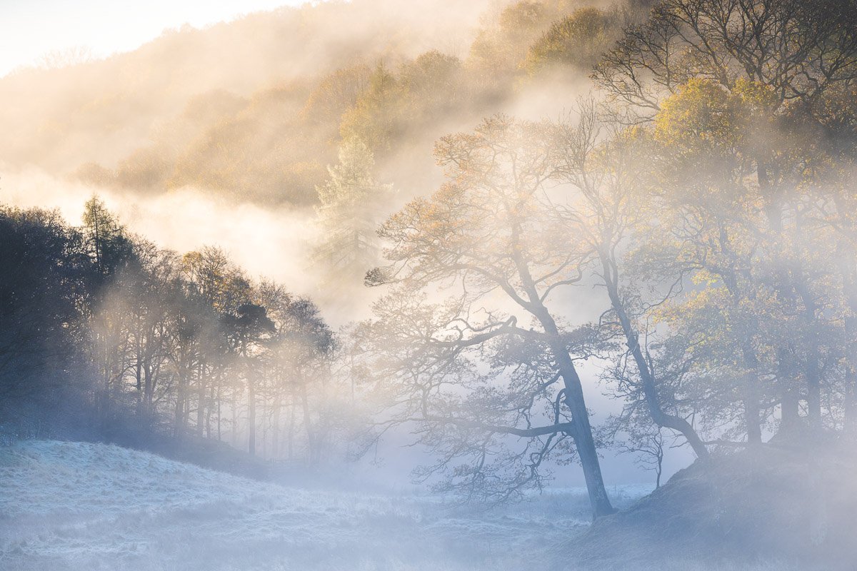 A frosty and misty dawn in autumn on the River Brathay, in the Lake District National Park