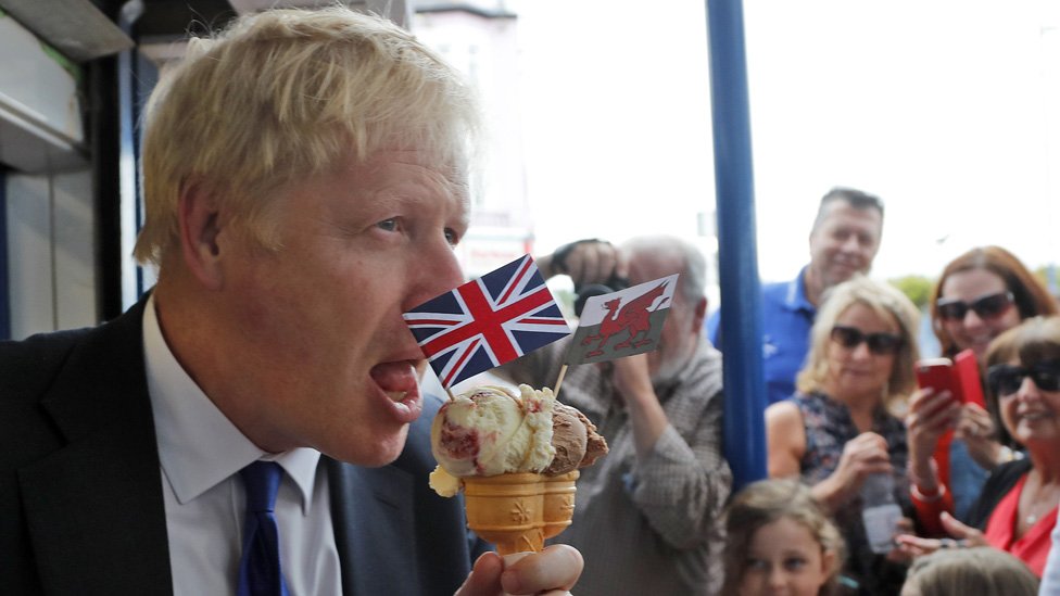 Boris Johnson eats an ice cream