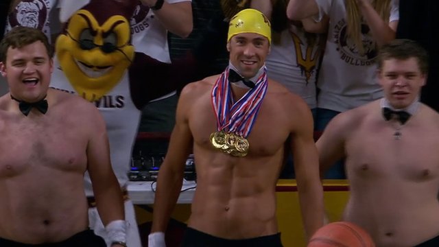 Michael Phelps takes part in the Arizona State Sun Devils college basketball team's "Curtain of Distraction"