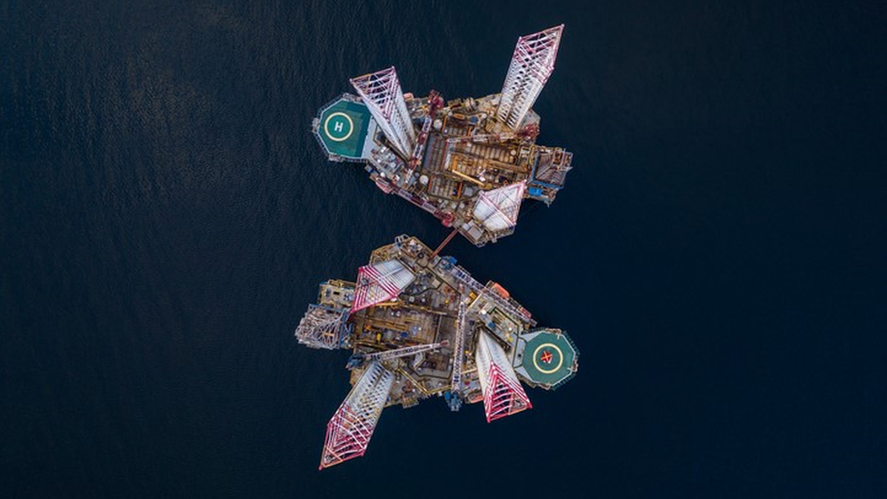 Aerial image of two offshore oil platforms, Cromarty Firth, Scotland, United Kingdom