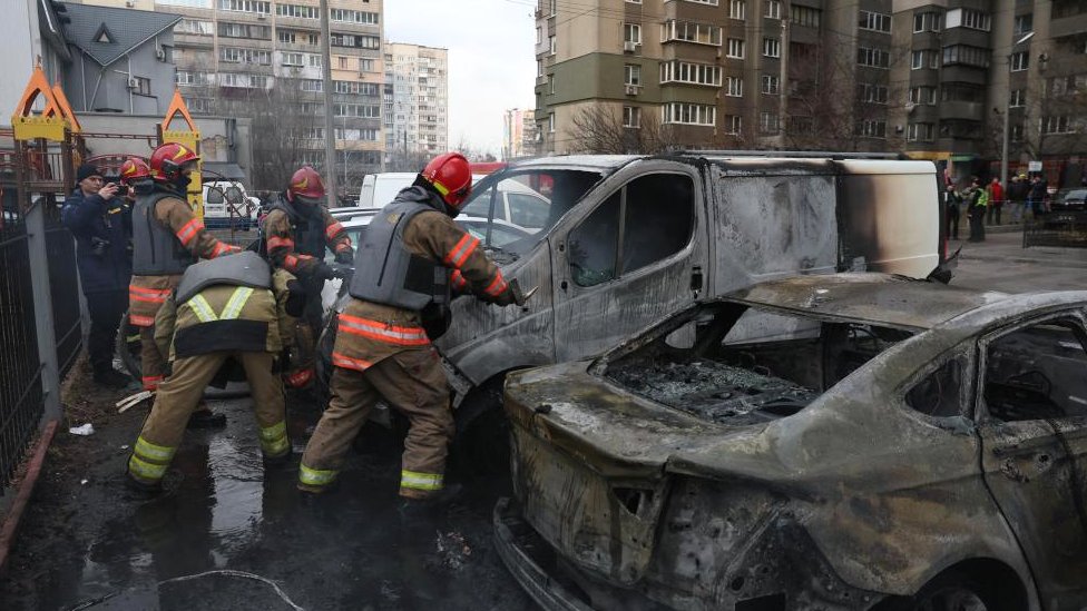 Emergency workers at the site of a Russian missile strike in Kyiv, Ukraine, on 9 March, 2023
