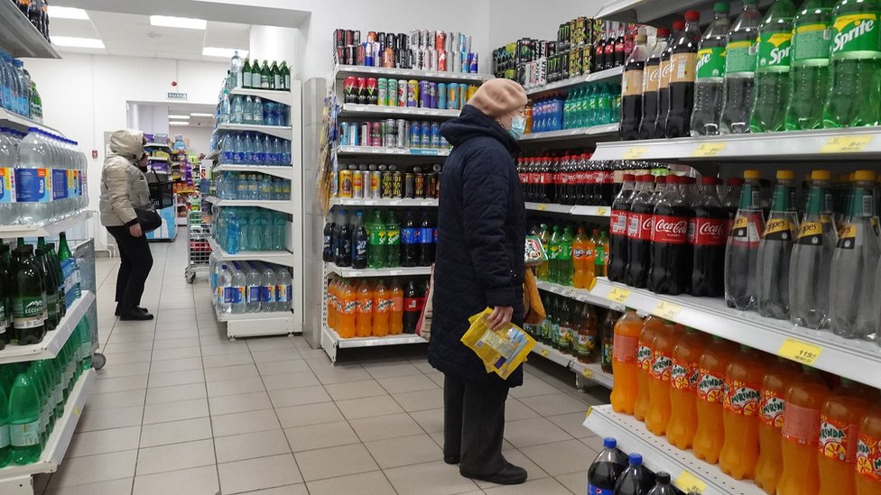 People do shopping at the Russian retailer "Magnit" store, one of the country"s major supermarket chains, in Podolsk, outside Moscow, Russia, 21 April 2022