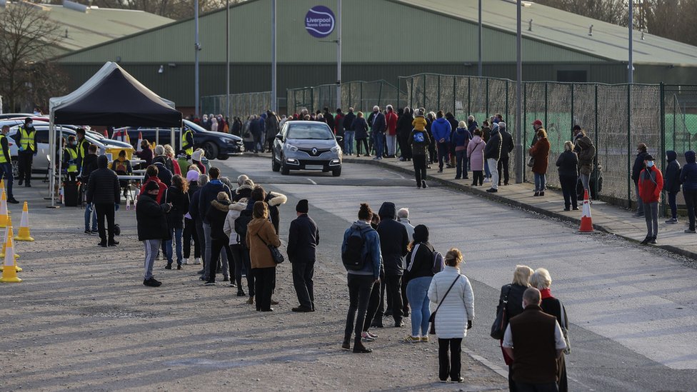 People waiting to be tested in Liverpool