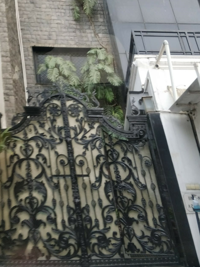 Srivastava Group's office gate in Delhi, with (right) nameplate for Indian Institute for Non-Aligned Studies and New Delhi Times, both linked to SG