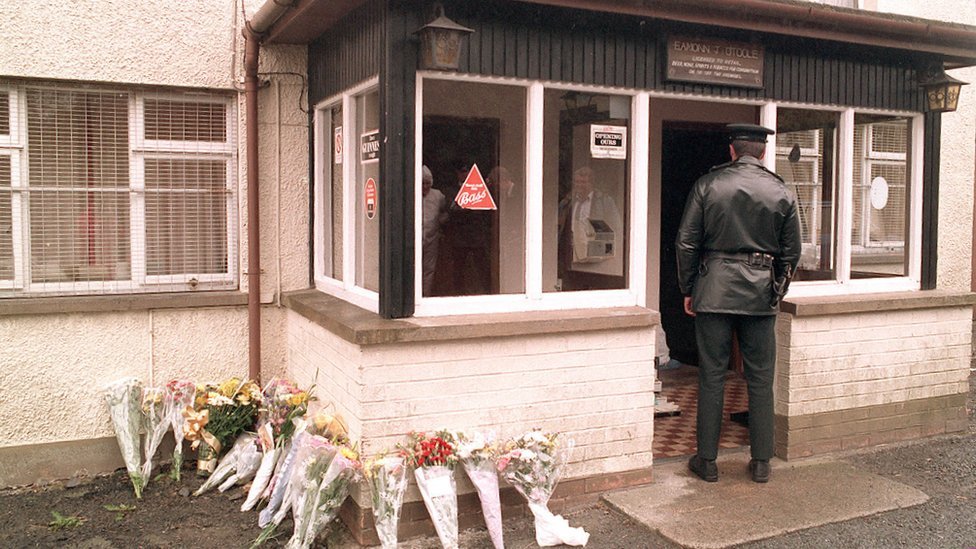 A police officer at the Heights Bar in Loughinisland after the attack in 1994