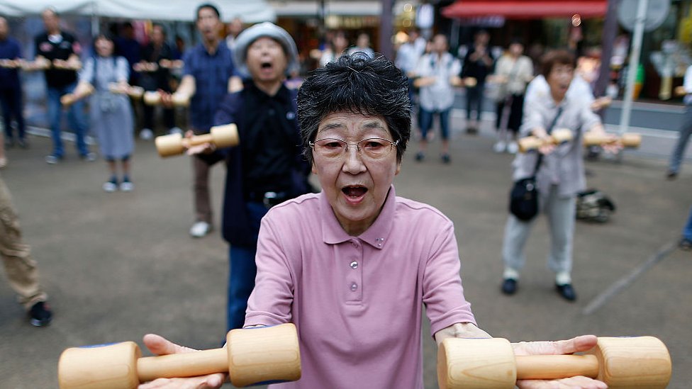 Elderly people exercising in Japan