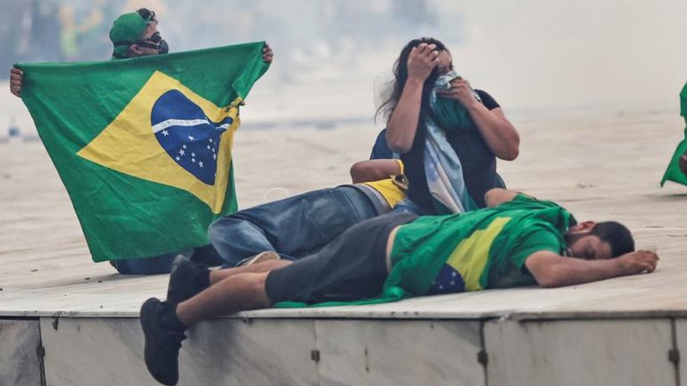 Supporters of Brazil's former President Jair Bolsonaro react during a demonstration against President Luiz Inacio Lula da Silva, outside Planalto Palace in Brasilia, Brazil, January 8, 2023.