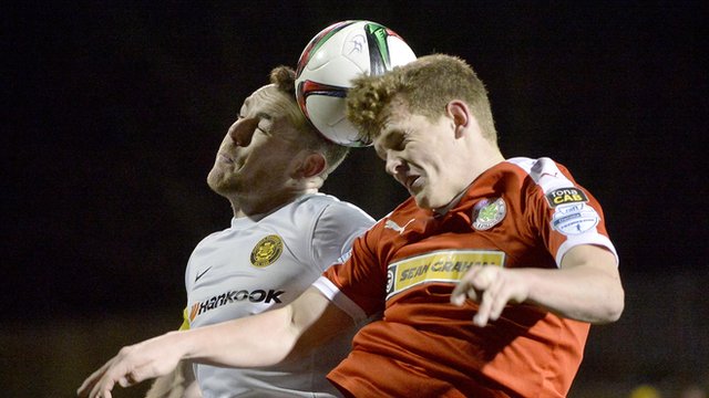 Action from Cliftonville against Carrick Rangers