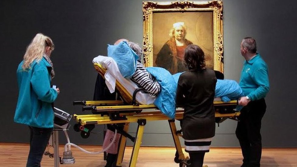 A patient being taken to a museum