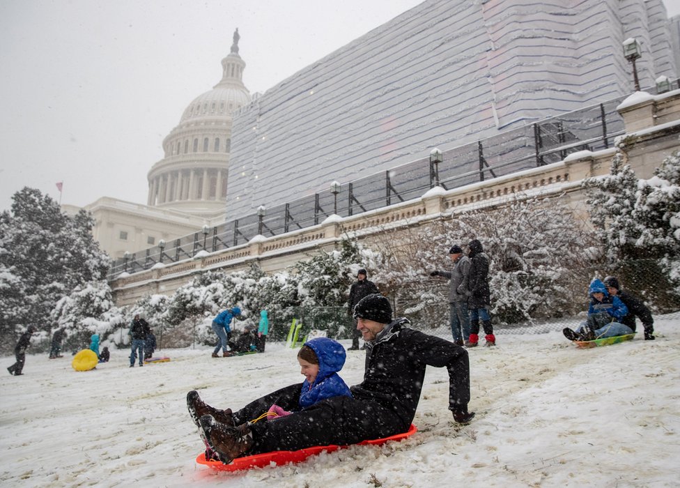 People sledging on Capitol Hill in Washington