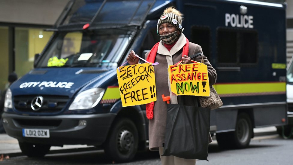 A supporter of Wikileaks founder Julian Assange outside the Old Bailey, London, ahead of a judgement in his extradition case. Assange, 49, faces an 18-count indictment, alleging a plot to hack computers and a conspiracy to obtain and disclose national defence information.