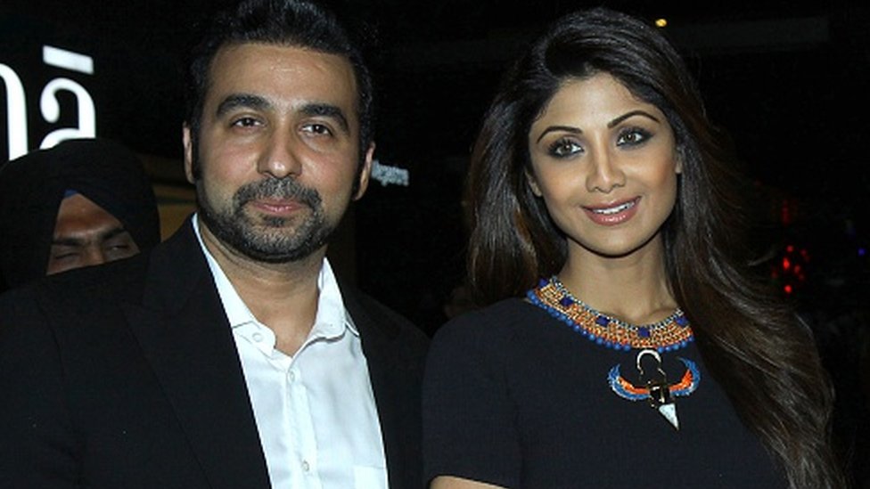 Indian Bollywood actress Shilpa Shetty (R) poses with her husband Raj Kundra as they attend the Indian premiere of the Hollywood film 'Fast & Furious 7' in Mumbai late April 1, 2015.