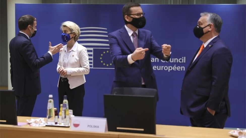 French President Emmanuel Macron (L) speaks with European Commission President Ursula von der Leyen as Hungary`s Prime Minister Viktor Orban (R) speaks with Poland`s Prime Minister Mateusz Morawiecki at the start of a two days face-to-face EU summit , in Brussels, Belgium, 10 December 2020.