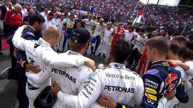 F1 drivers stand in a circle to remember Jules Bianchi