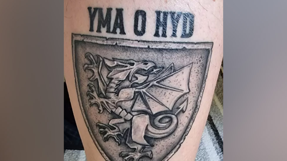 Yma o Hyd: Welsh World Cup anthem seeing rise in tattoos - BBC News