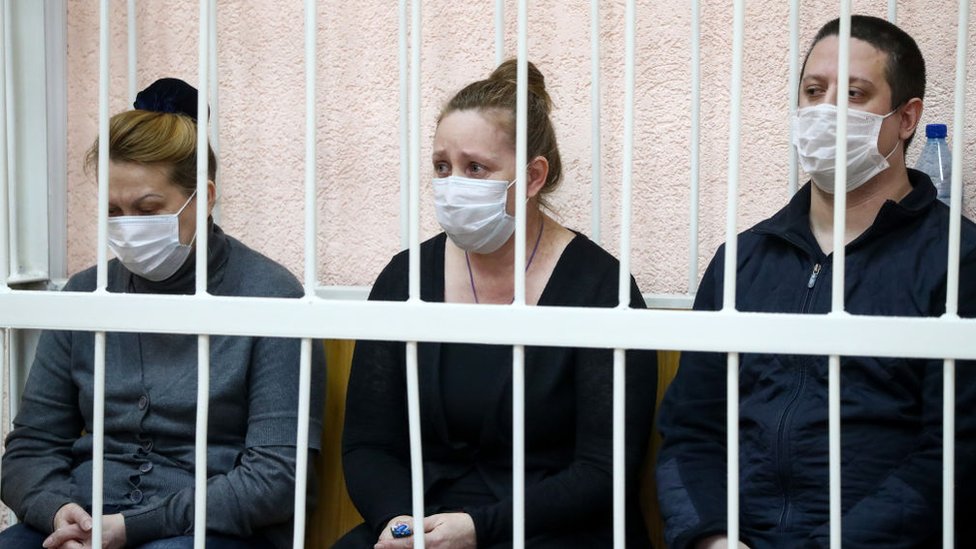 Three of the eight jailed: (L-R) Bogdanova, Suddenok and Antyushin