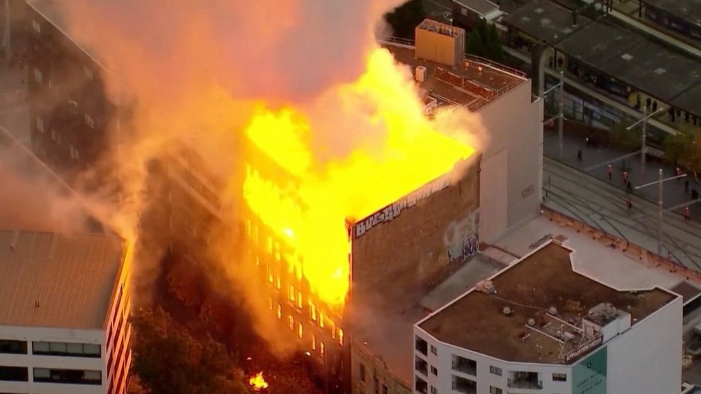 Walls collapse as fireball engulfs Sydney building