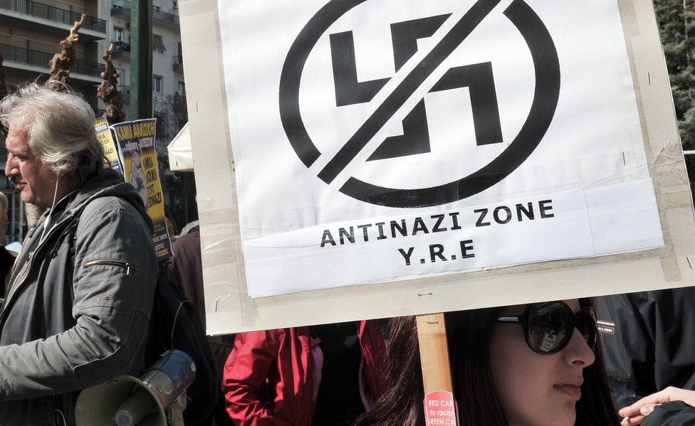 Anti-racist and anti-nazi activists gather outside the appeals court in Athens in 2013