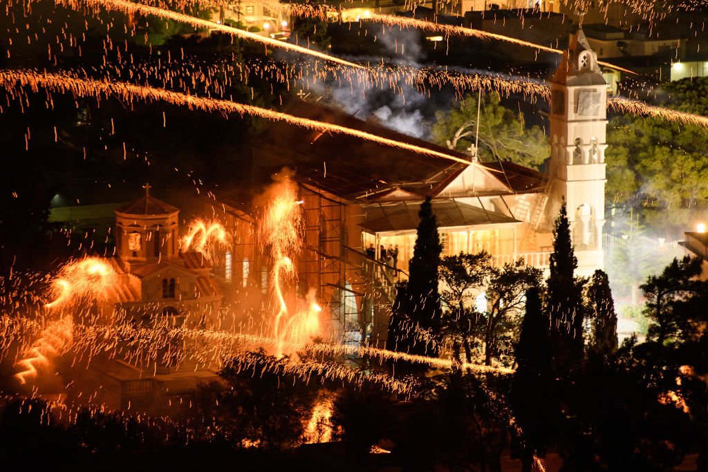 The Panaghia Erithiani church is hit by rockets from supporters of the Aghios Marko church.