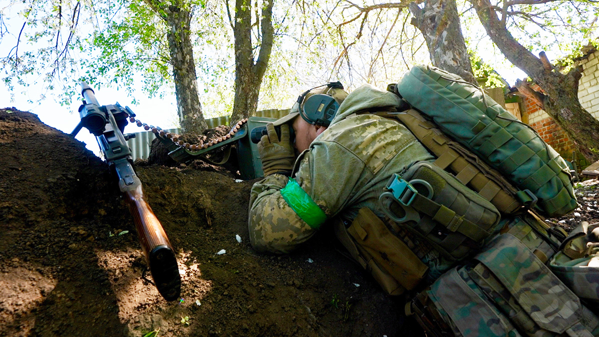 Taking cover in a foxhole