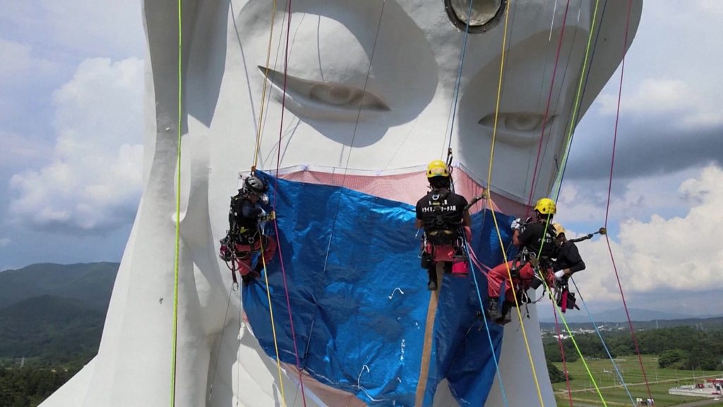 Giant Buddhist statue gets Covid face mask in Japan