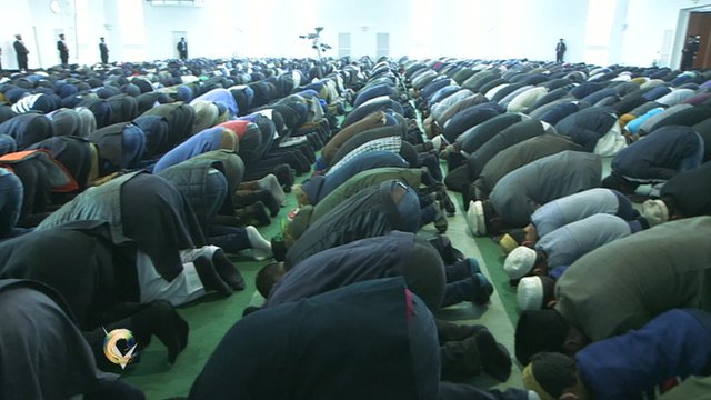 Men praying in Mosque
