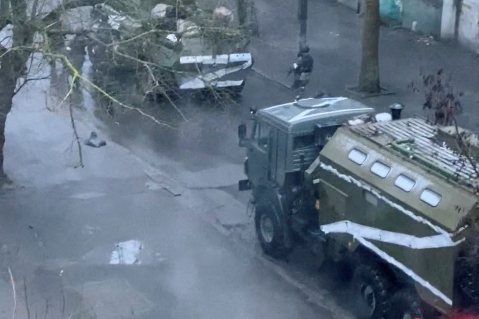 Russian military vehicles are seen on the street in Kherson, south-eastern Ukraine