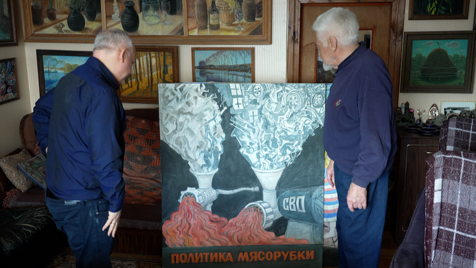 Vladimir Ovchinnikov shows off his art