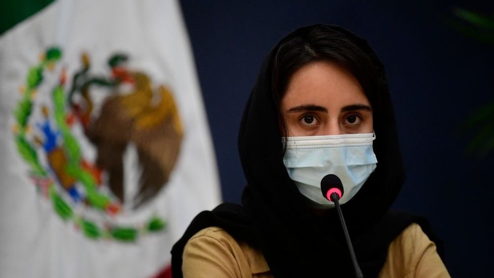 An "Afghan Dreamer" is seen during a press conference in Mexico City