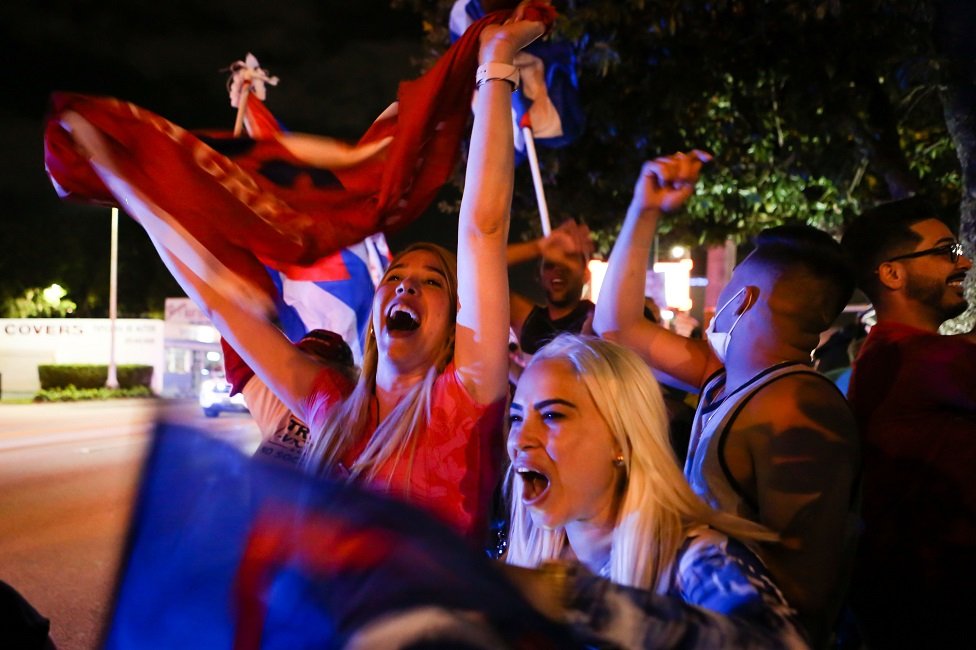 Supporters of US President Donald Trump rally in front of Cuban restaurant Versailles in Miami, Florida on 3 November