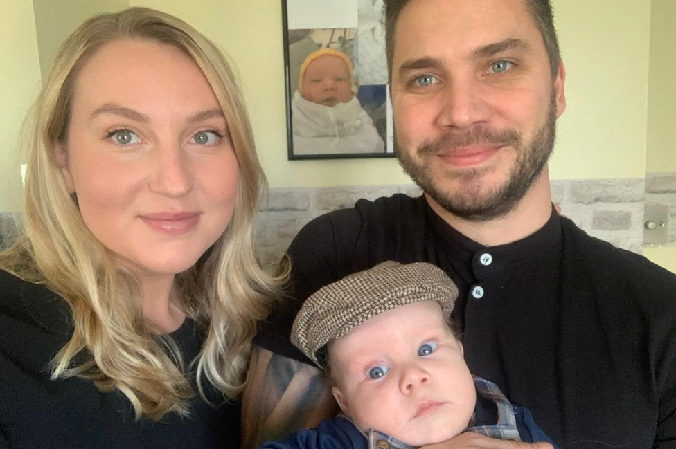 Megan Willis and John Hall, with their baby Edward.