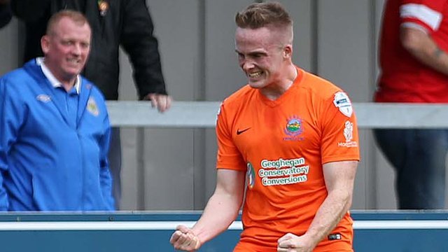 Linfield's Aaron Burns celebrates scoring against Warrenpoint Town