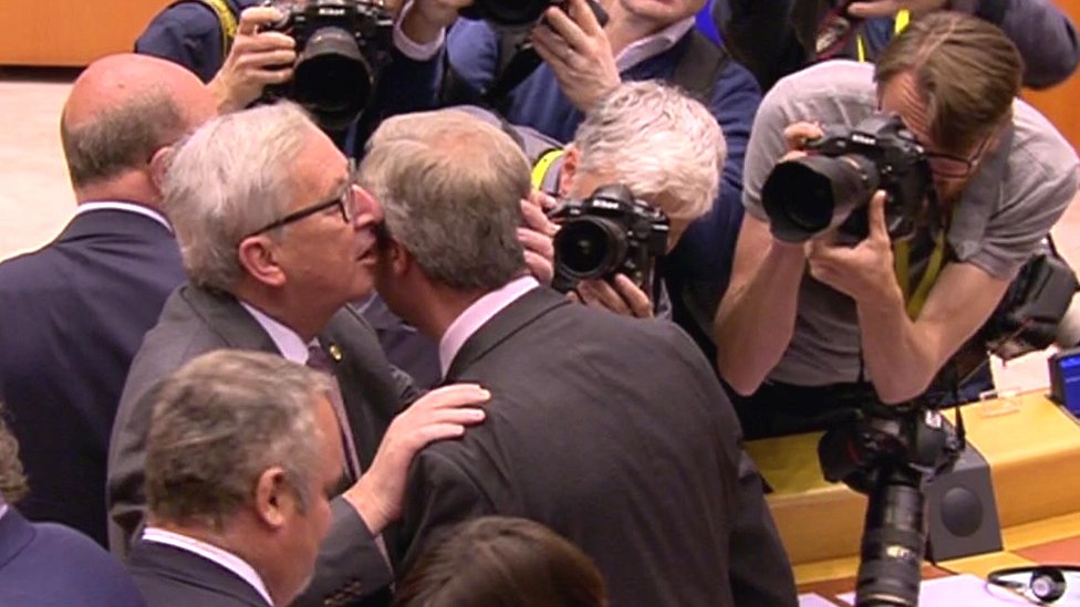 EU Commission President Jean-Claude Juncker (left) and UKIP leader Nigel Farage