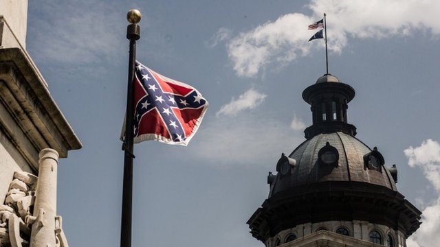 Confederate flag lowered in South Carolina - BBC News