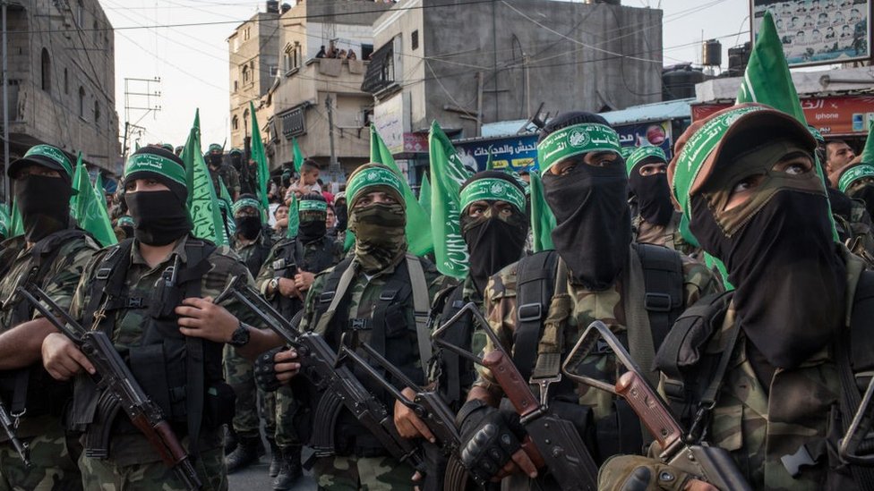 Hamas militants are seen during a military show in Gaza City in 2017