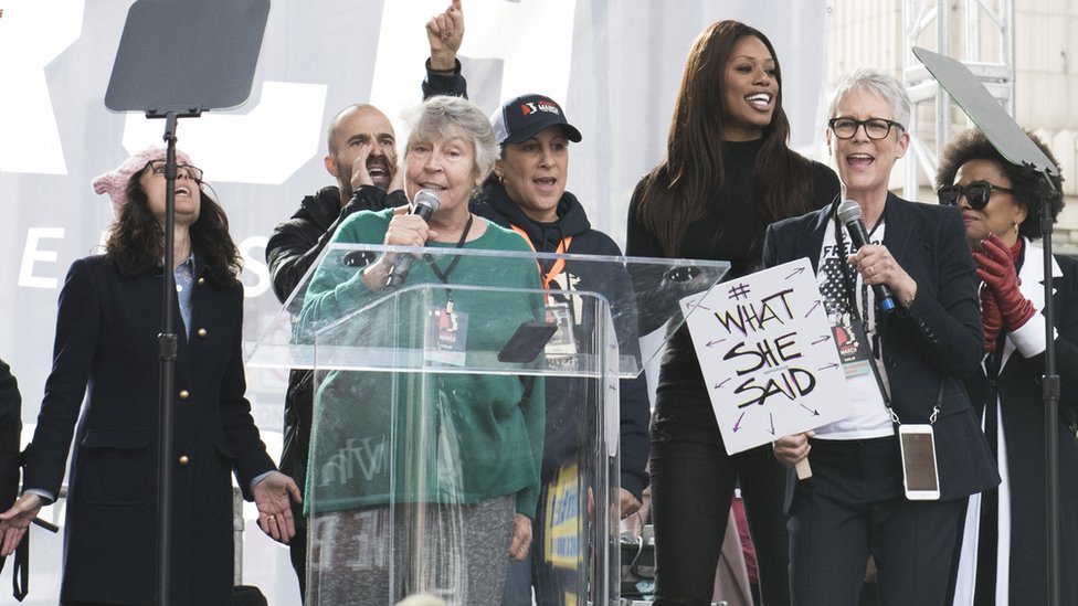 Reddy with celebrities including Jamie Lee Curtis at a Women's March in 2017