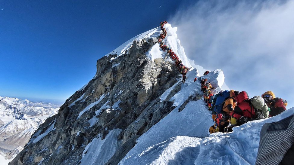 The viral photo from last month of two rows of climbers simultaneously ascending and descending close to Mount Everest's summit
