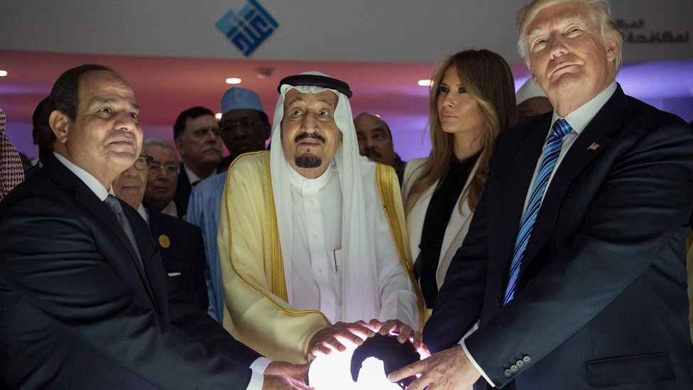 Egyptian President Abdul Fattah al-Sisi, Saudi Arabia's King Salman and US President Donald Trump place their hands on a globe at the World Center for Countering Extremist Thought in Riyadh, Saudi Arabia, 21 May 2017