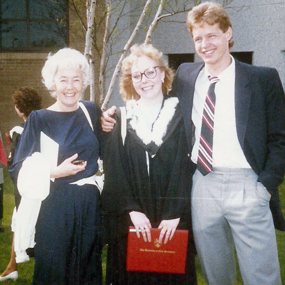 With her mum and brother on her graduation day from the University of New Brunswick in 1987