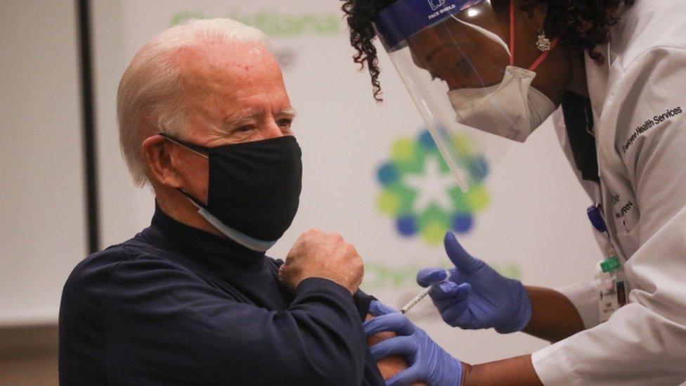 Covid: US President-elect Joe Biden gets vaccine live on TV - BBC News