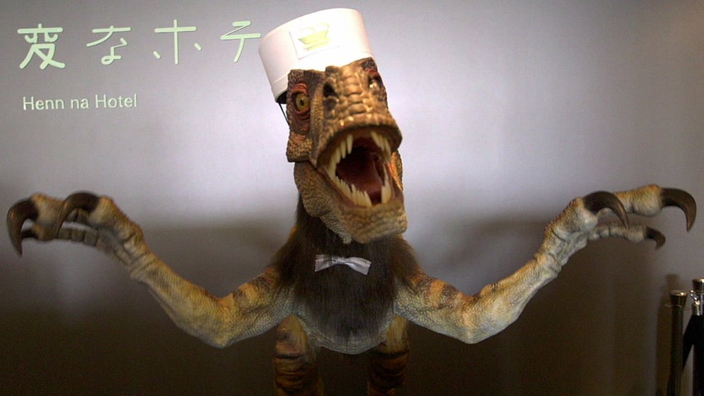 An English-speaking robotic dinosaur receptionist at the Henn na hotel