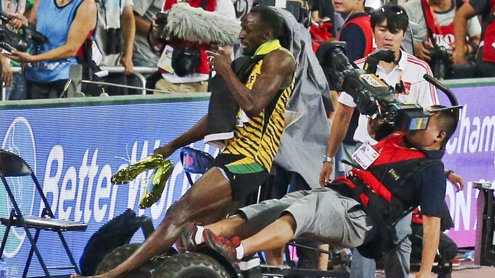 Caída de Usain Bolt con camarógrafo en Segway en el Mundial de Atletismo de Pekín en 2015.